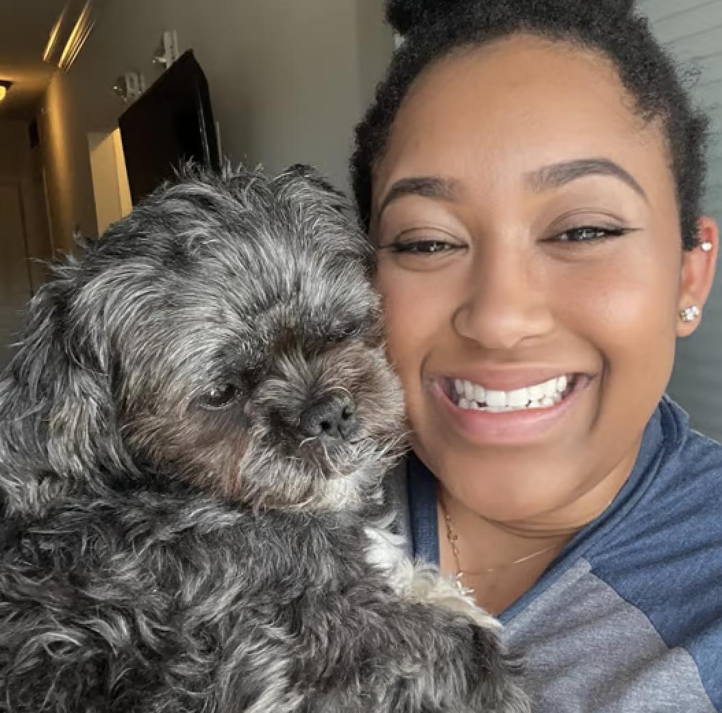 Portrait of Gabrie'le Eato and her dog Winston