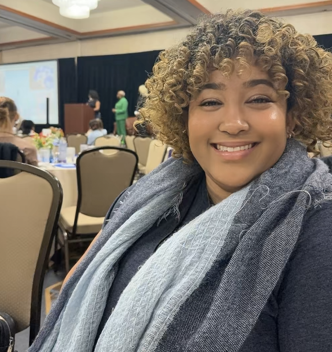 Gabrie'le Eato networking and connecting with mental health advocates during a NAMI Ohio leadership event.