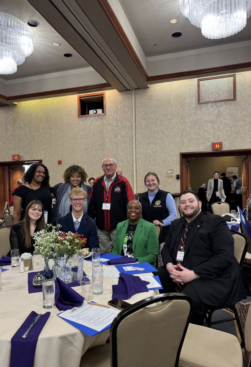 Gabrie'le Eato speaking with attendees at a NAMI advocacy event focused on mental health awareness, autism advocacy, and ADHD education.